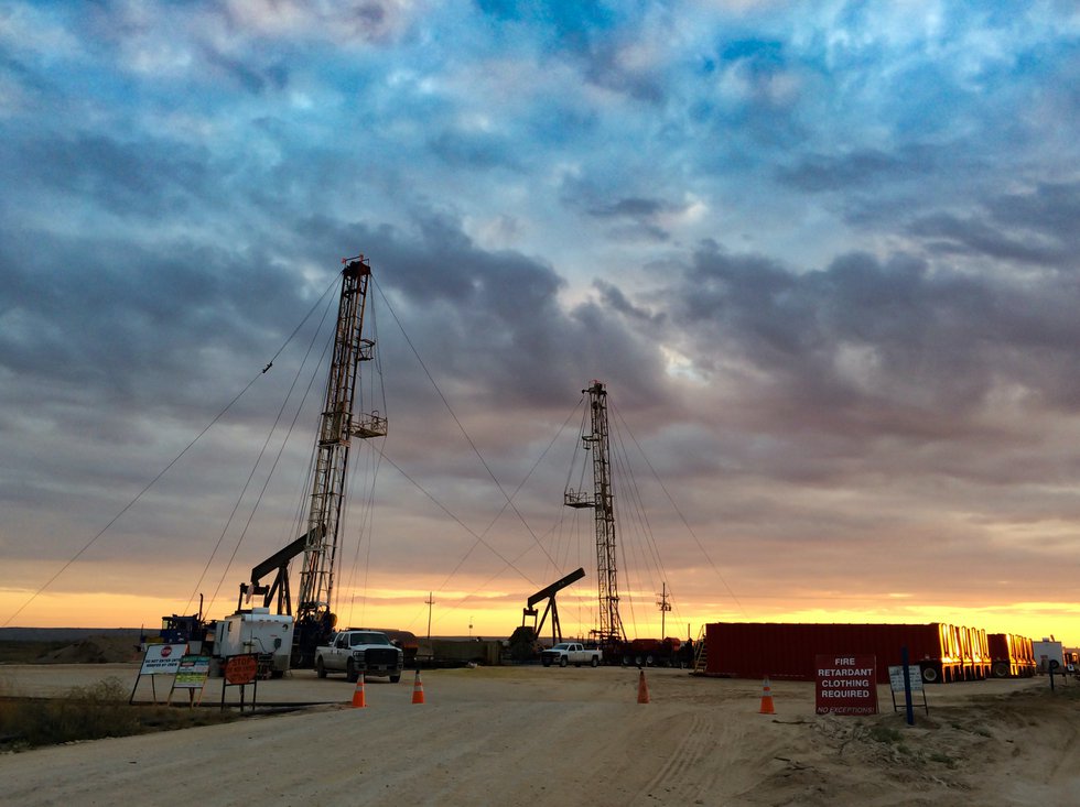 Two Workover Rigs at Sunset Simops